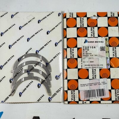 Вкладыш коленвала упорный T099A / T2510A STD VQ20 / VQ25 / VQ30 DAIDO